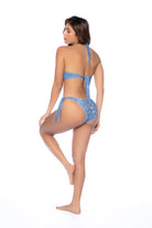 A stylish two-piece swimsuit crafted in a denim bandana stitching print perfect for a bold, fun look. Features supportive top with fringe details and side-tie medium coverage bottom.